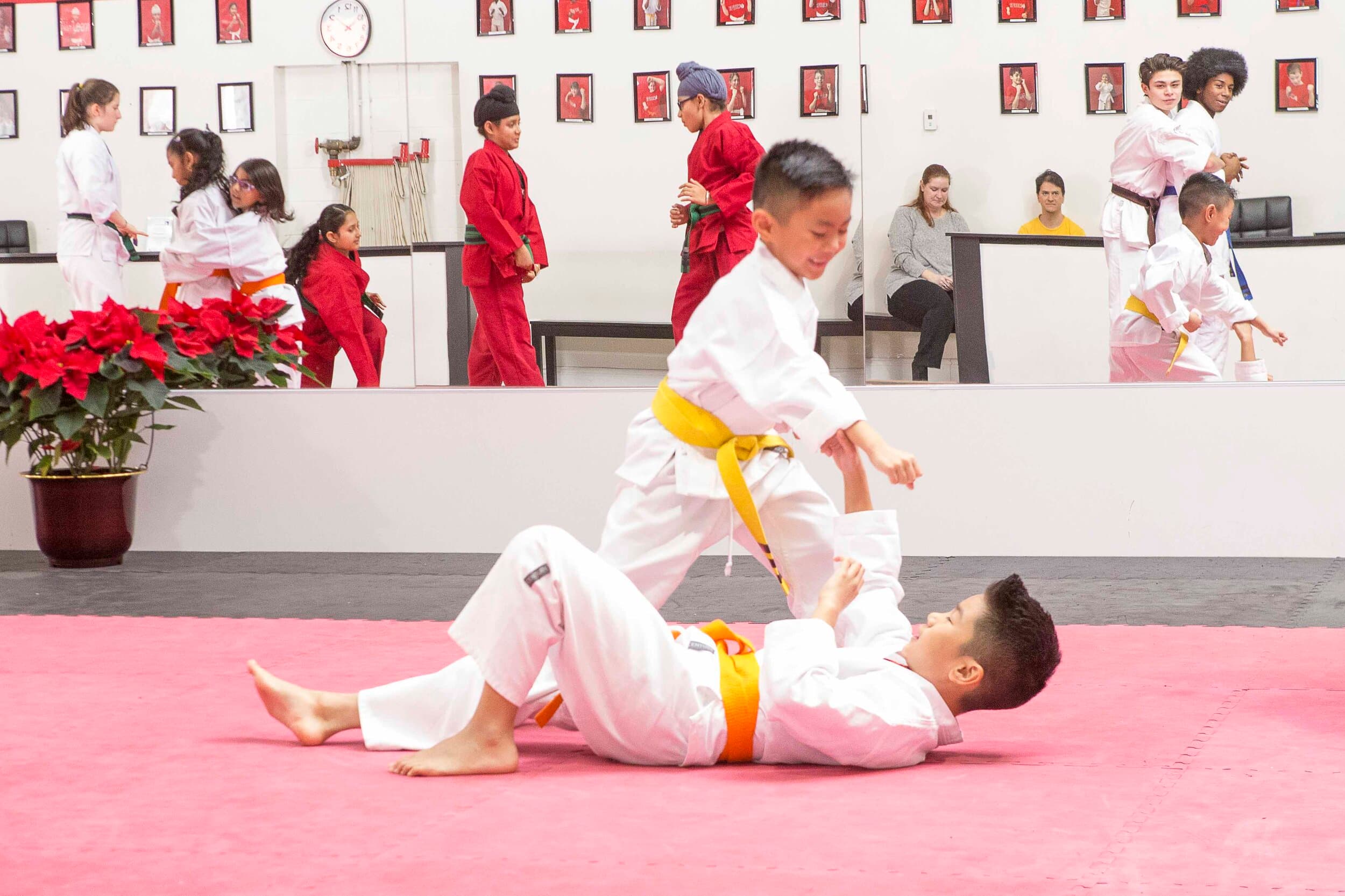 Kids running in the dojo
